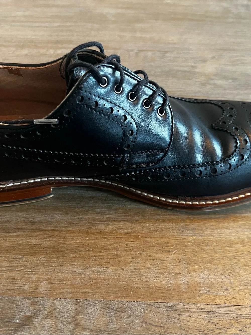Classic Black Leather Wingtip Oxfords with Contrast Welt